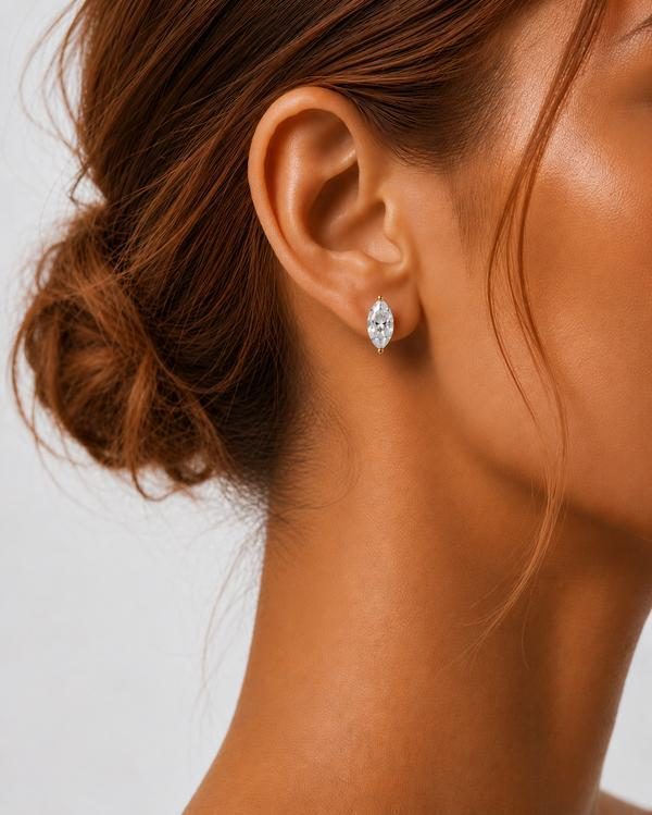 Marquise diamond stud, prong set, worn on the ear